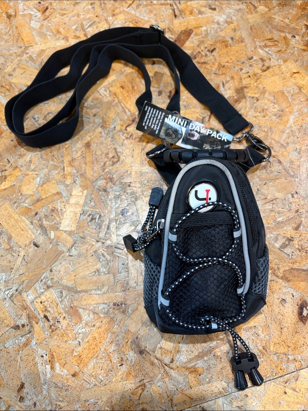 Exclusive Short Par 4 item- Black Mini Daypack Sling Bag with Reflective Trim